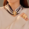 Wholesale Women's Fashion Titanium Steel Geometric Irregular Petal Scarf Buckle Ring With Pearl And Electroplating