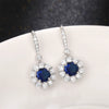 Wholesale Women's Fashionable Copper Long Earrings With Sapphire Blue Zircon And Flower Design
