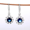 Wholesale Women's Fashionable Copper Long Earrings With Sapphire Blue Zircon And Flower Design