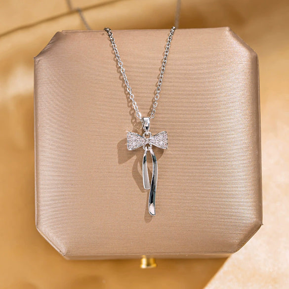 Wholesale Women's Fashionable Diamondset Bow Pendant Necklace In Titanium Steel And Copper With Cross Chain