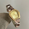 Wholesale Women's Fashionable Elegant Round Dial Alloy Case Super Fiber Strap Snake Pattern Watch