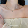 Wholesale Women's Fashionable Retro Lovely Pearl Stitching Double Layer Clavicle Chain Necklace With Heart Shaped Pendant And Pearl Chain