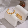 Wholesale Women's Flower Cshaped Stainless Steel Vacuum Real Gold Plated Earrings