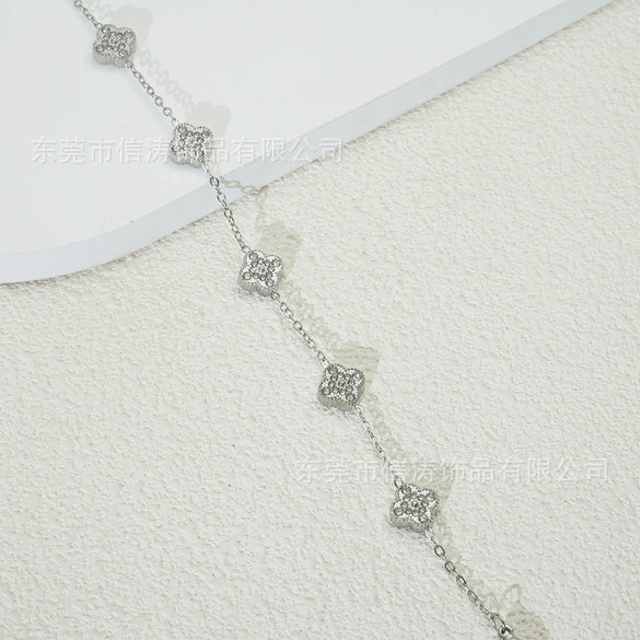 Wholesale Women's Fourleaf Clover Bracelet With Floral And Leaf Patterns Made Of Titanium Steel And Goldplated