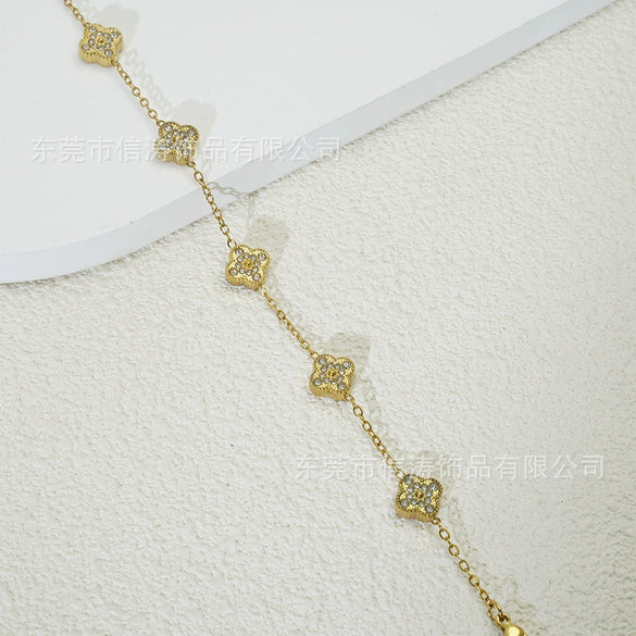 Wholesale Women's Fourleaf Clover Bracelet With Floral And Leaf Patterns Made Of Titanium Steel And Goldplated
