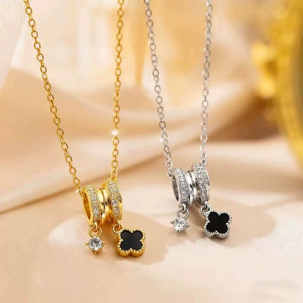 Wholesale Women's Fourleaf Clover Pendant Necklace In Light Luxury Style With Copper Inlaid Zircon And Titanium Steel O Word Chain Electroplated