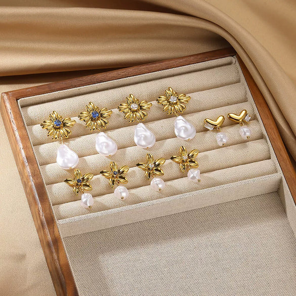 Wholesale Women's French Retro Imitation Pearl And Stainless Steel Geometric Exaggerated Heart And Flower Shape Electroplated Earrings
