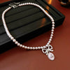 Wholesale Women's French Retro Light Luxury Clavicle Chain Set With Alloy Pendant And Imitation Pearls Electroplating