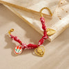 Wholesale Women's French Retro Printed Rope Chain Goldplated Cut Out Stainless Steel Heartshaped Flower Ceramic Pendant Bracelet
