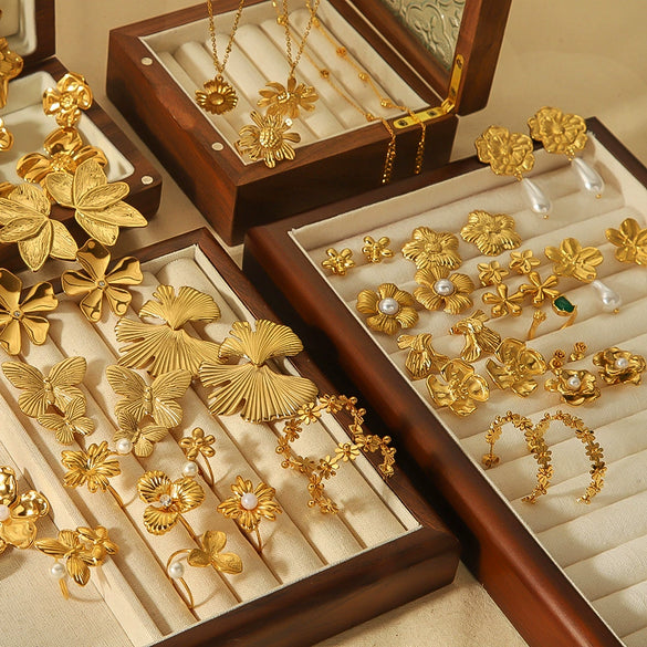 Wholesale Women's French Vintage Ins Style Flower Butterfly Leaf Titanium Steel Earrings With Electroplating