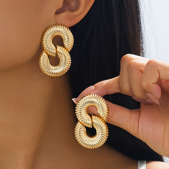 Wholesale Women's Geometric Alloy And Stainless Steel Electroplated Hollow Twist Thread Earrings
