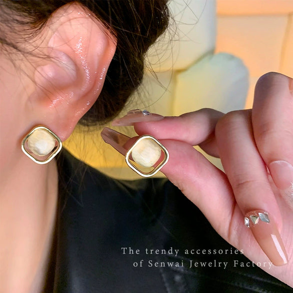 Wholesale Women's Geometric Alloy Earrings With 225 Silver Needles And Cat's Eye Stones Electroplated