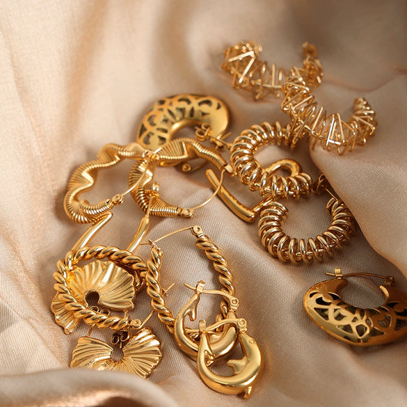 Wholesale Women's Geometric C Shaped Hollow Titanium Steel 18K Gold Electroplated Earrings