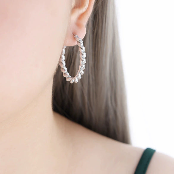 Wholesale Women's Geometric C Shaped Hollow Titanium Steel 18K Gold Electroplated Earrings