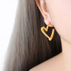 Wholesale Women's Geometric C Shaped Hollow Titanium Steel 18K Gold Electroplated Earrings