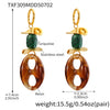 Wholesale Women's Geometric Ferris Wheel Oval Pig Nose Electroplated Stainless Steel Resin Turquoise Earrings