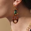 Wholesale Women's Geometric Ferris Wheel Oval Pig Nose Electroplated Stainless Steel Resin Turquoise Earrings