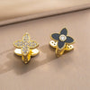 Wholesale Women's Geometric Fourleaf Clover Doublesided Earrings Made Of Copper With Gold Plating