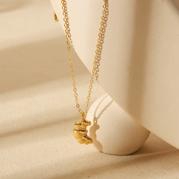 Wholesale Women's Geometric Fruit Food Style Croissant Pendant Necklace Made Of Stainless Steel And Titanium Steel With Electroplating