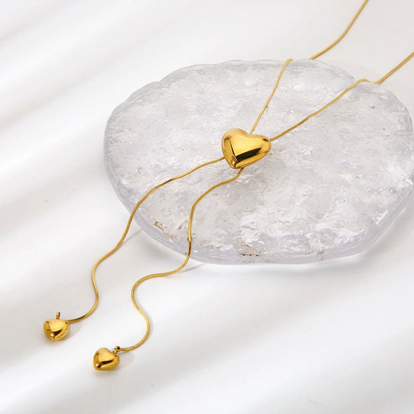 Wholesale Women's Geometric Gold Plated Stainless Steel Snake Bone Chain Heart Tassel Pullout Necklace