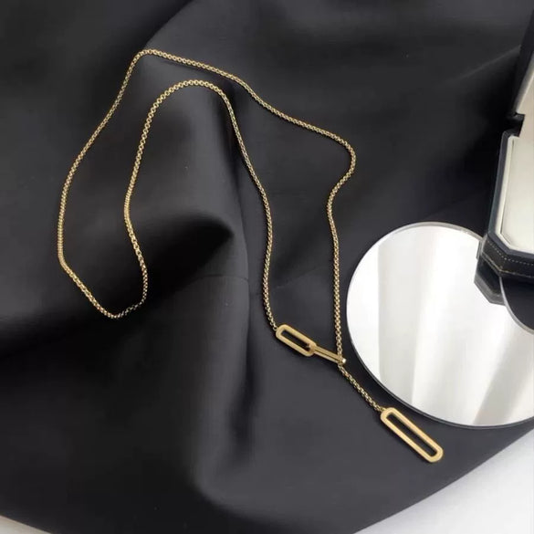 Wholesale Women's Geometric Goldplated Titanium Steel String Of Pearls Tassel Necklace Pendant Sweater Chain Accessories