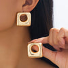 Wholesale Women's Geometric Hollow Circle Square Alloy Electroplated Earrings