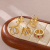 Wholesale Women's Geometric Hollow Flower Goldplated Inlaid With Gold Stainless Steel Zircon Ring With Fruit Shape And Pattern Light Luxury Style