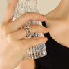Wholesale Women's Geometric Hollow Twist Opening Electroplated Titanium Steel Ring