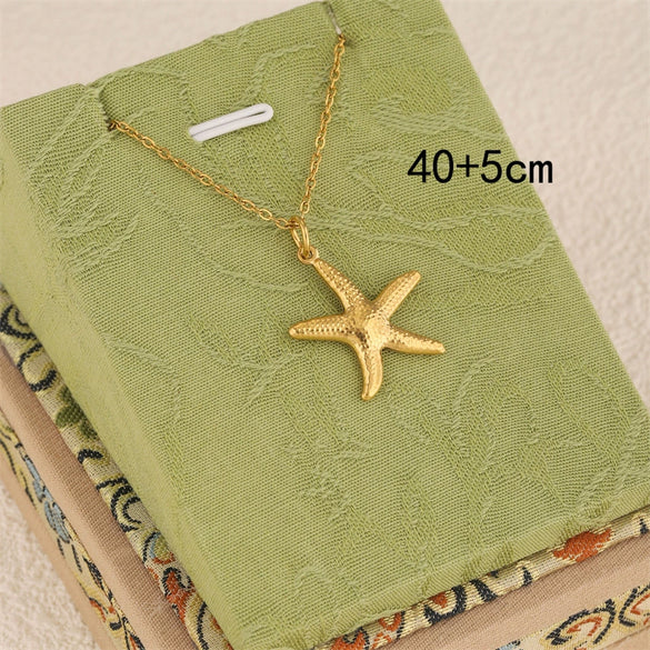 Wholesale Women's Geometric Minimalist Fivepointed Starfish Pendant Necklace Stainless Steel With 18K Gold Electroplating Cross Chain