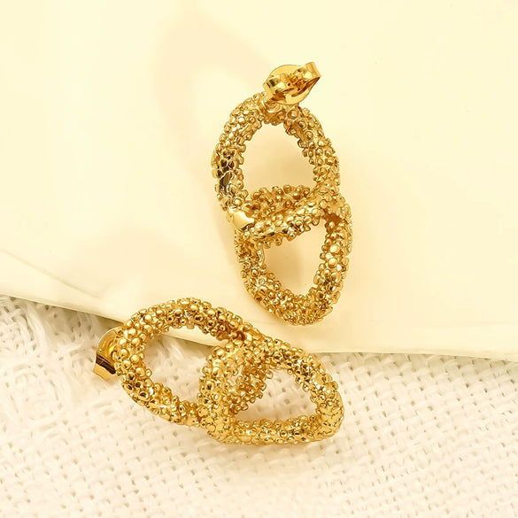 Wholesale Women's Geometric Oval Goldplated Titanium Steel Earrings With Stainless Steel Ear Needles