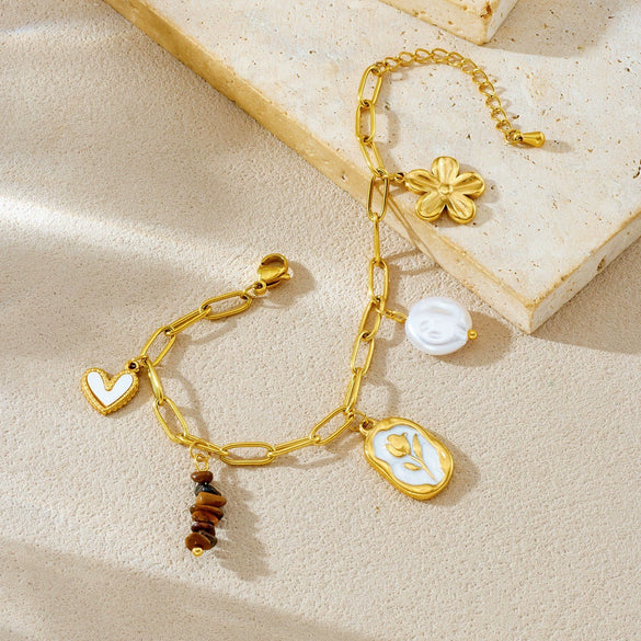 Wholesale Women's Geometric Pearl Tiger Eye Stone Pendant Flower Heart Stainless Steel Electroplated Accessories Set With Plants And Flowers Pattern
