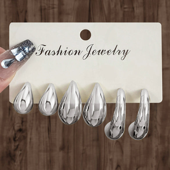 Wholesale Women's Geometric Plastic And Resin Water Drop And Cshaped Earrings With Electroplating Treatment