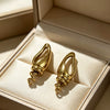 Wholesale Women's Geometric Spiral Hollow Stainless Steel Vacuum Electroplated Earrings
