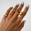 Wholesale Women's Geometric Stainless Steel And Titanium Steel Ring With Vacuum Real Gold Plating