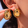 Wholesale Women's Geometric Stainless Steel And Zircon Electroplated Ferris Wheel Oval Diamond Earrings