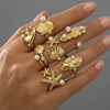 Wholesale Women's Geometric Stainless Steel Electroplated Inlaid Pearl Rings