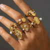 Wholesale Women's Geometric Stainless Steel Electroplated Inlaid Pearl Rings