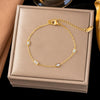 Wholesale Women's Geometric Stainless Steel Real Gold Plated Bracelet With Four Leaf Clover Pendant