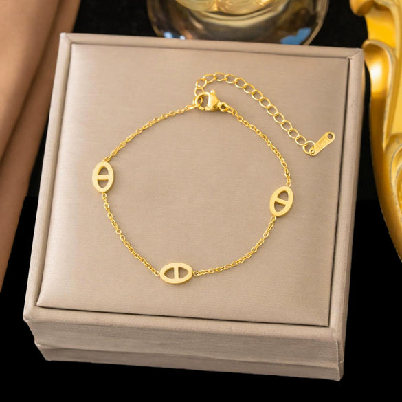 Wholesale Women's Geometric Stainless Steel Real Gold Plated Bracelet With Four Leaf Clover Pendant