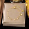 Wholesale Women's Geometric Stainless Steel Real Gold Plated Bracelet With Four Leaf Clover Pendant