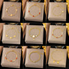 Wholesale Women's Geometric Stainless Steel Real Gold Plated Bracelet With Four Leaf Clover Pendant