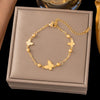 Wholesale Women's Geometric Stainless Steel Real Gold Plated Bracelet With Four Leaf Clover Pendant