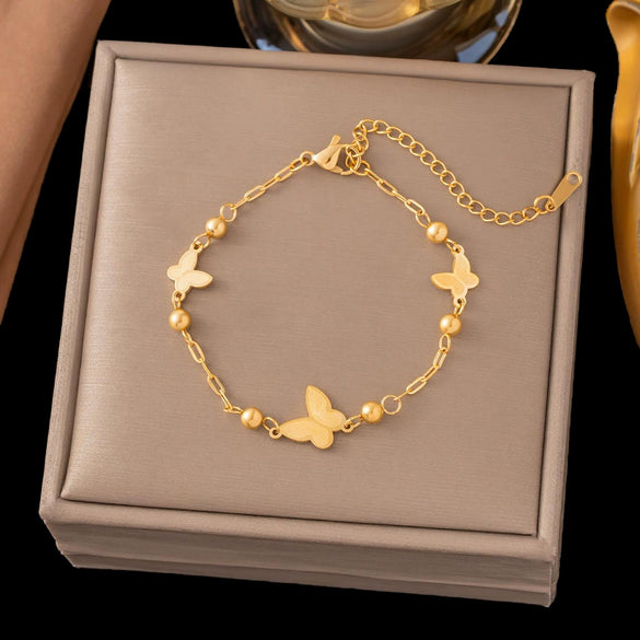 Wholesale Women's Geometric Stainless Steel Real Gold Plated Bracelet With Four Leaf Clover Pendant