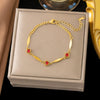 Wholesale Women's Geometric Stainless Steel Real Gold Plated Bracelet With Four Leaf Clover Pendant
