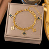 Wholesale Women's Geometric Stainless Steel Real Gold Plated Bracelet With Four Leaf Clover Pendant
