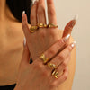 Wholesale Women's Geometric Stainless Steel Ring With Line Rope Knot Texture And Electroplating Processing