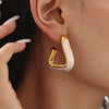 Wholesale Women's Geometric 316L Stainless Steel Electroplated Fashion Pearl Powder Oil Drop Hollow Earrings