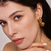 Wholesale Women's Geometric Titanium Steel Electroplated Hollow Cshaped Ferris Wheel Earrings