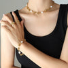 Wholesale Women's Geometric Titanium Steel Gold Plated Freshwater Pearl Kink Chain Necklace Bracelet Earrings Jewelry Set