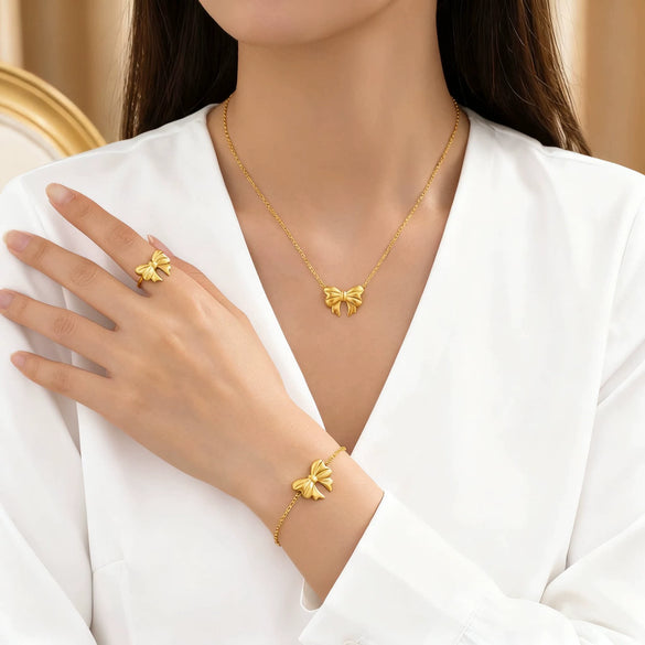 Wholesale Women's Geometric Titanium Steel Necklace And Bracelet Set With 18K Gold Plated O Word Chain And Ribbon Bow Pendant